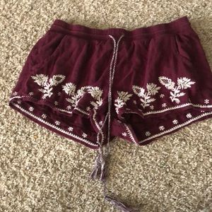 Purple/ burgundy shorts